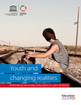 Cover showing a youth sitting on rail tracks facing away